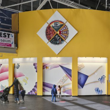 Visitors to installation interact with paintings