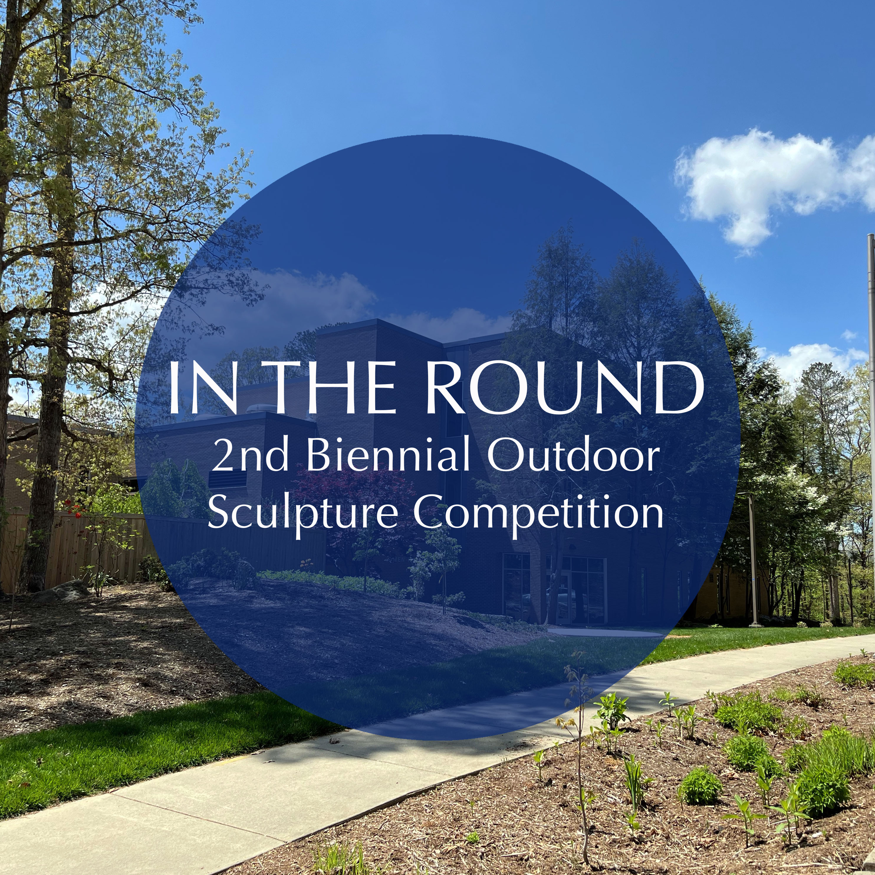 title of exhibition in blue circle with Owen Hall in background