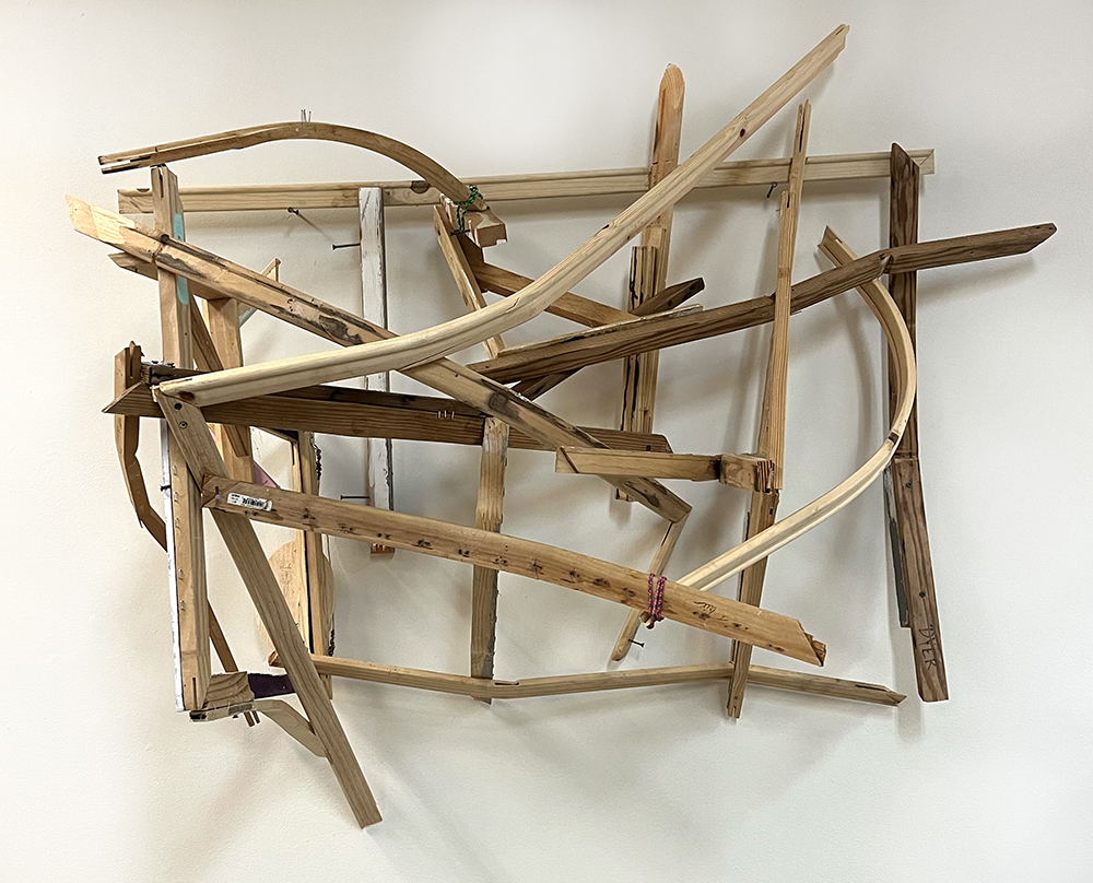 several wood strip pieces assembled haphazardly