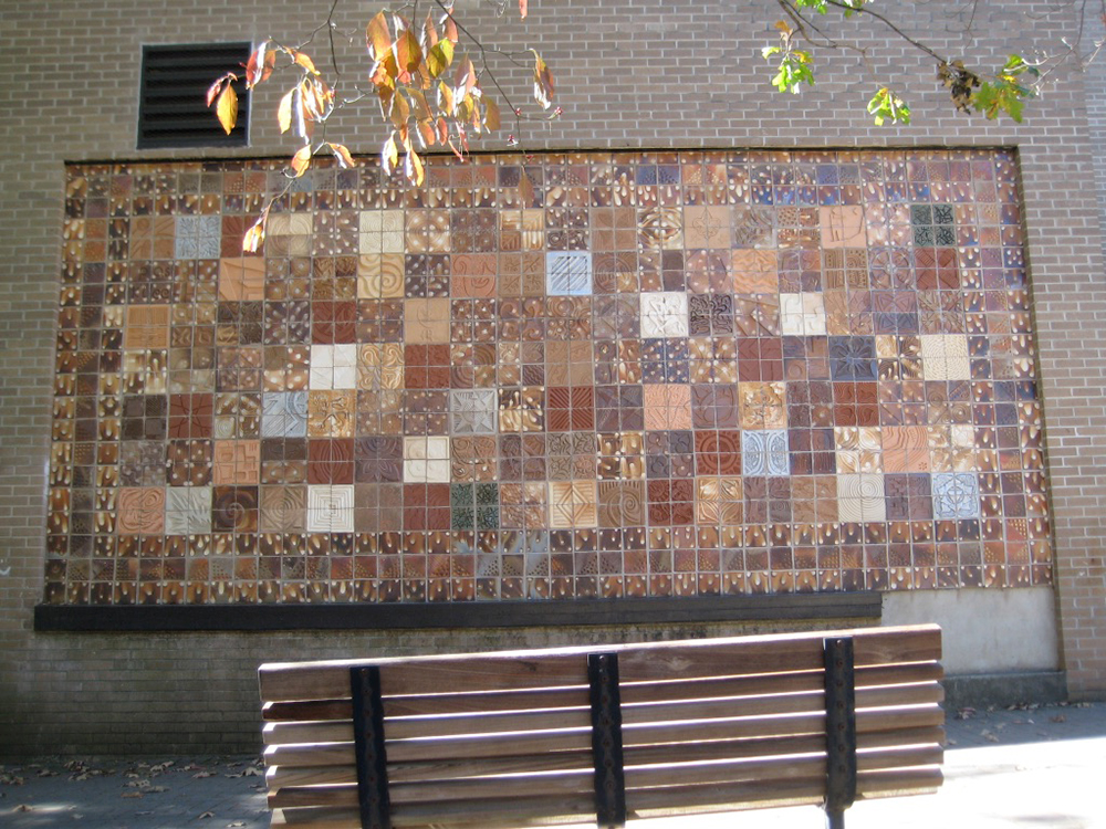 ceramic, bronze and aluminum collaborative tile wall at Owen Hall