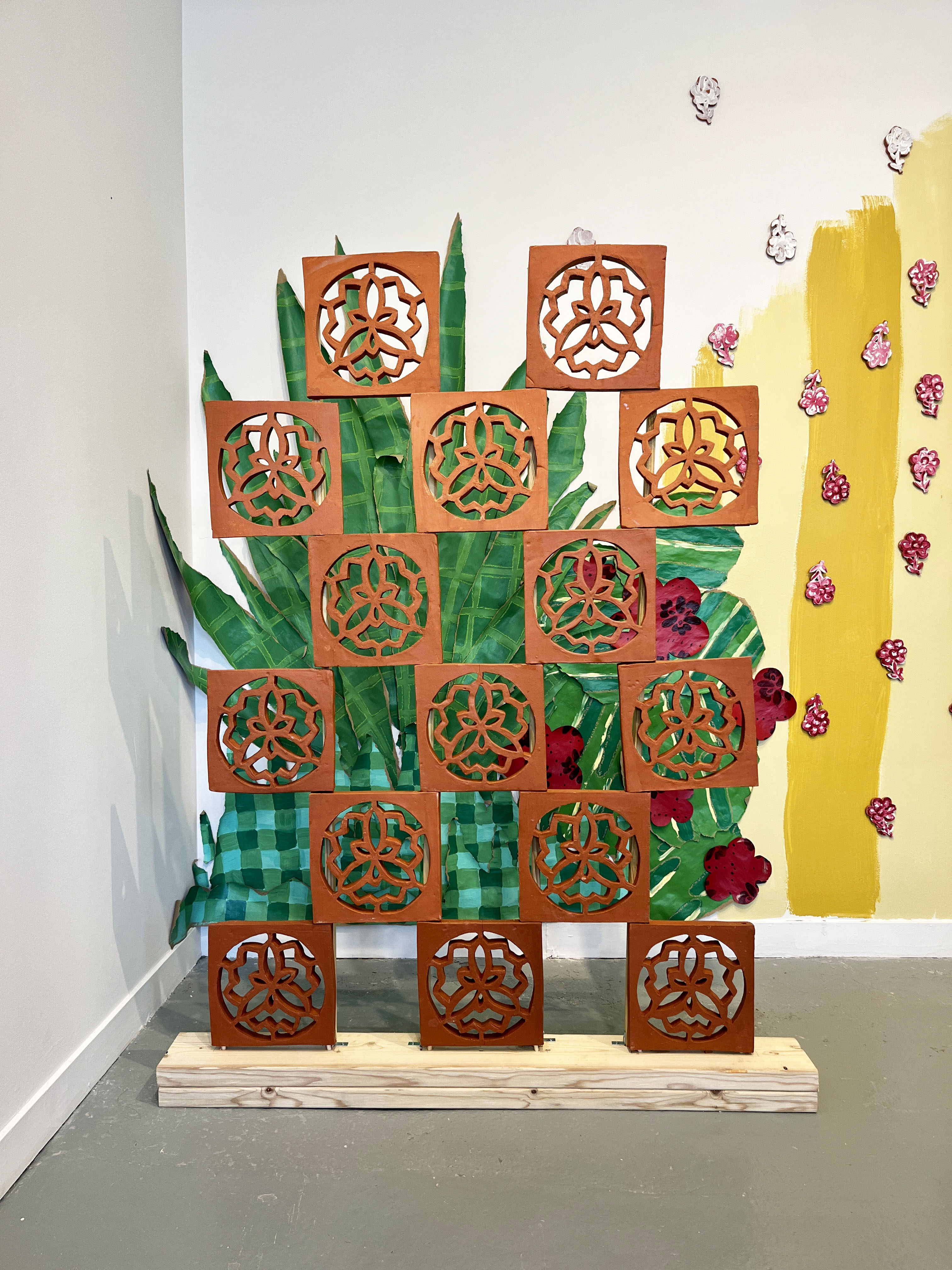 detail shot of installation with ceramic blocks stacked in checkerboard pattern