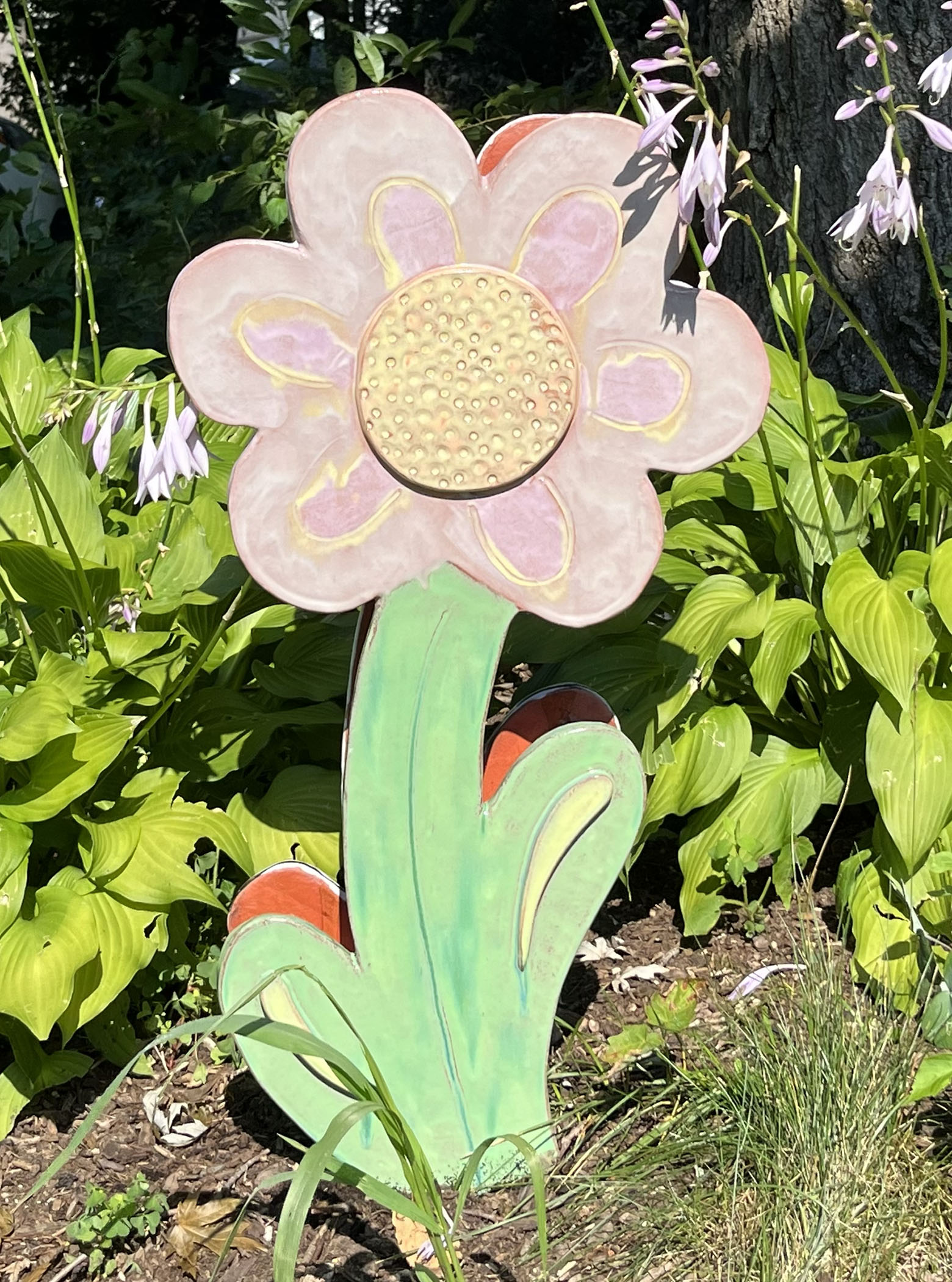 ceramic flower in garden