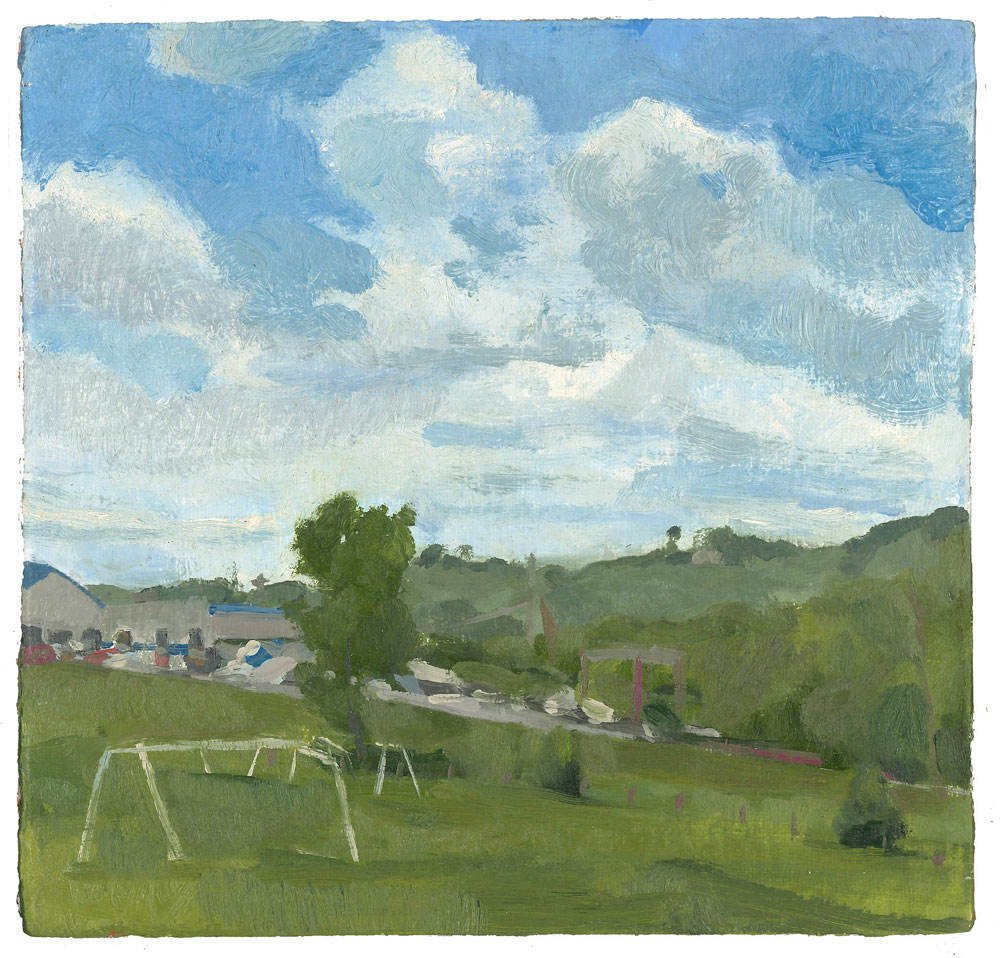 soccer field with cloudy skies