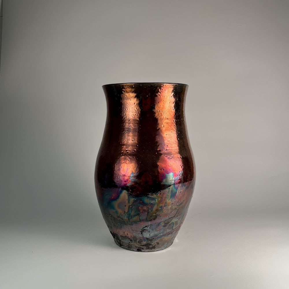 Ceramic vessel with raku firing