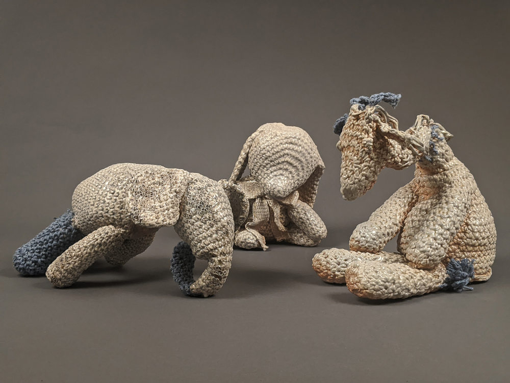 Yarn stuffed animals died in clay